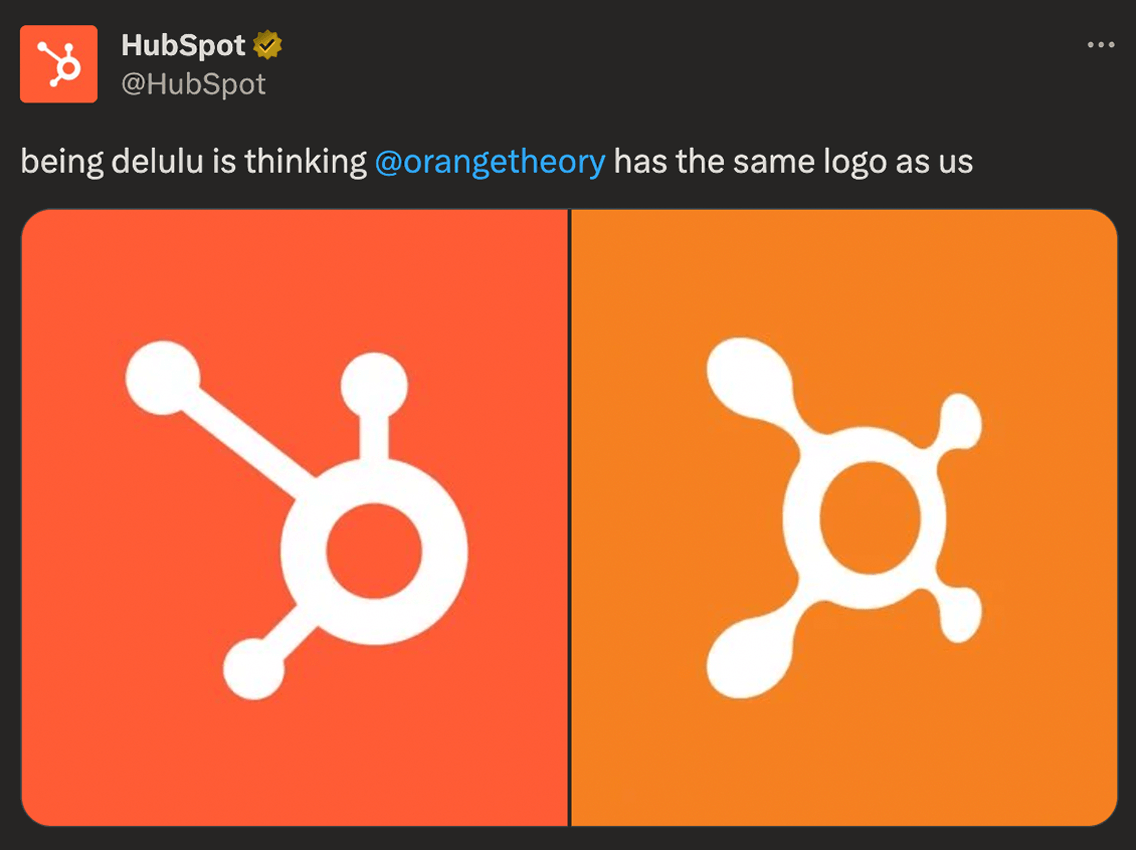 @HubSpot on Twitter says 'being delulu is thinking @orangetheory has the same logo as us' and it's an image of HubSpot and Orange Theory's logos next each other.